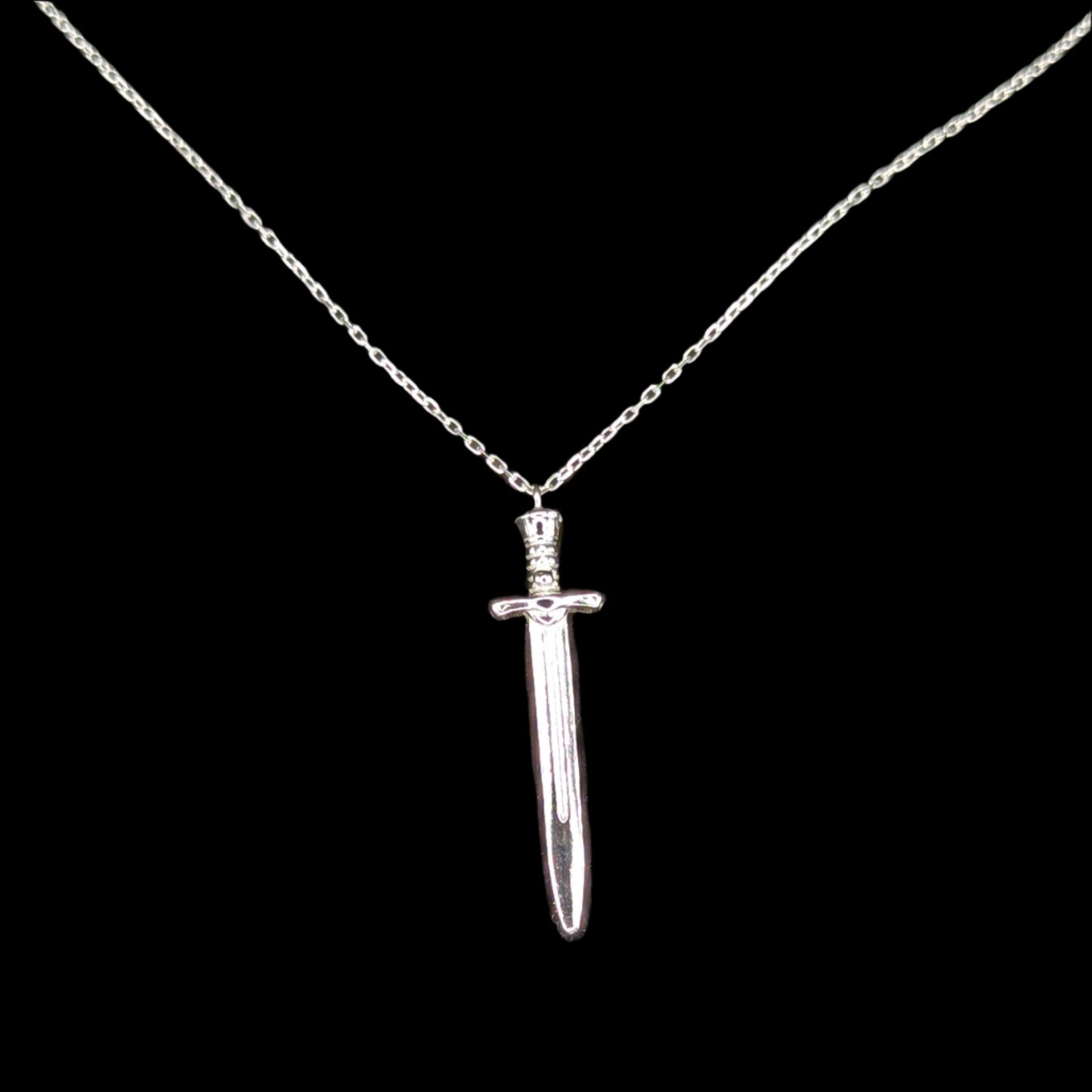 Silver sword-shaped pendant on a chain against a black background