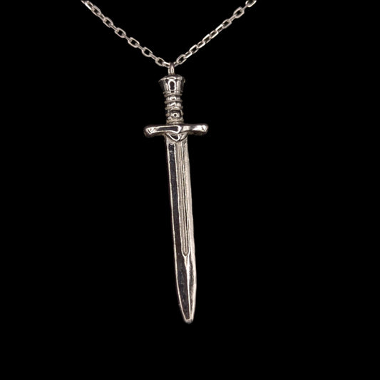 Silver dagger pendant necklace on a black background